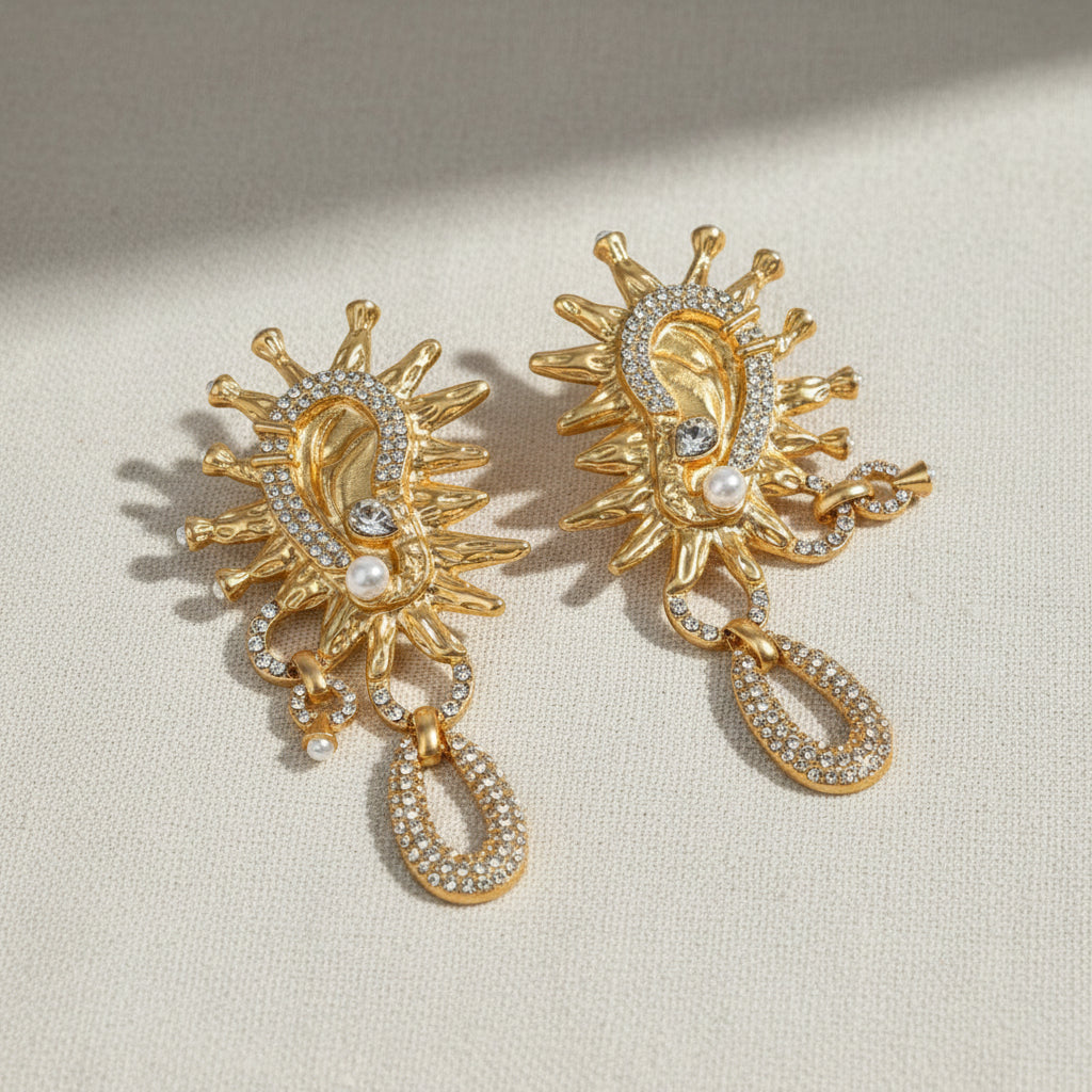 Vintage Sun God crystal earrings lifestyle display shot, surrealist gold jewelry by The Civilis