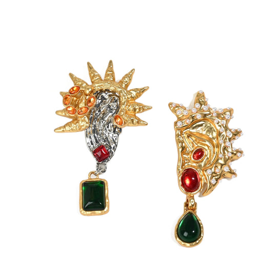 Surrealist asymmetric statement earrings in 18K gold plated finish, full product view on white background