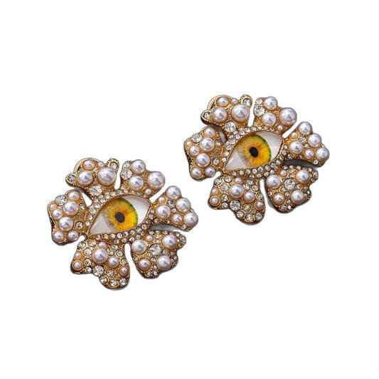 Maximalist Baroque Pearl Evil Eye Earrings on white background, 18K gold-plated zinc alloy with S925 silver post