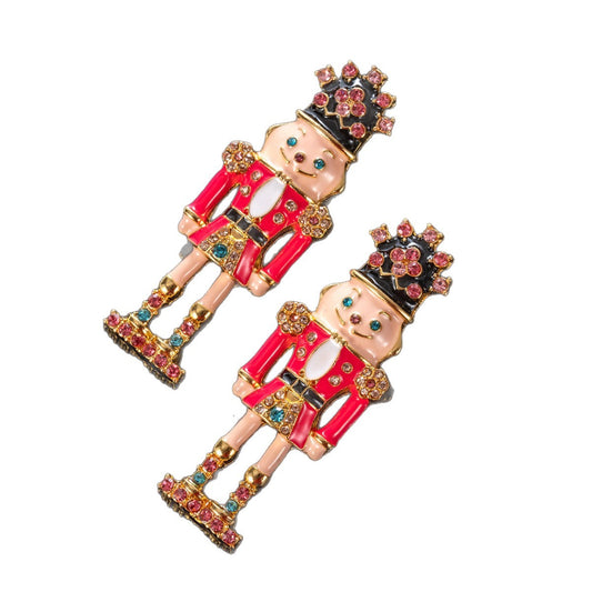 Vintage Nutcracker Soldier Earrings on white background, full view