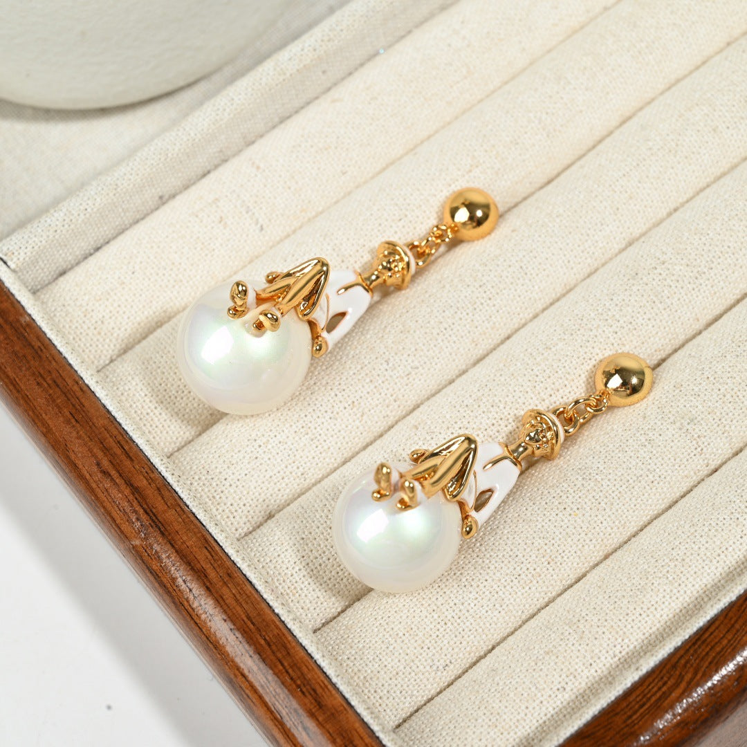 Vintage whimsical ballerina on pearl drop earrings lifestyle detail, figural fine jewelry by The Civilis