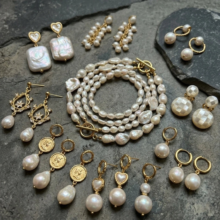 Natural baroque pearl and 18K gold-plated rings, necklaces, and earrings collection display by The Civilis