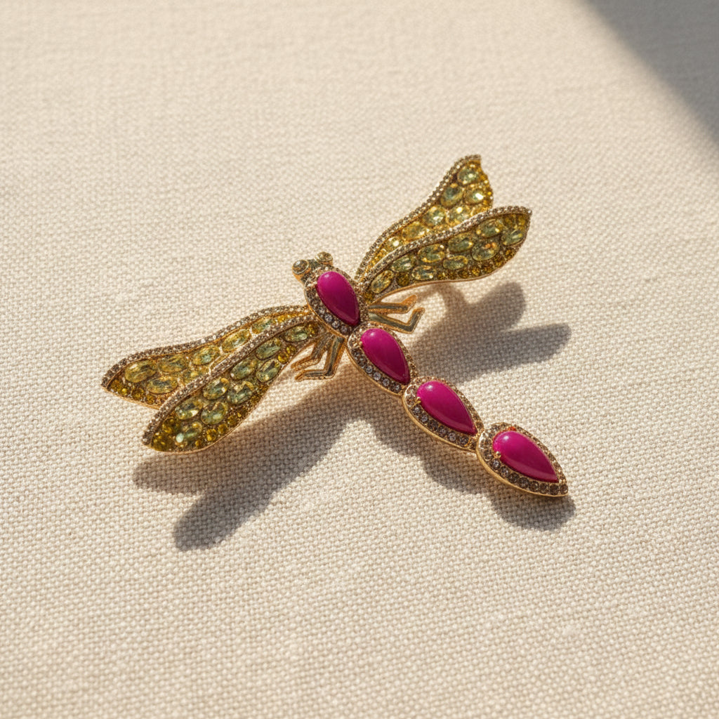 A close-up of the oversized dragonfly brooch by The Civilis, emphasizing its bold, maximalist design and intricate craftsmanship. Perfect for structured coats or as a centerpiece accessory.