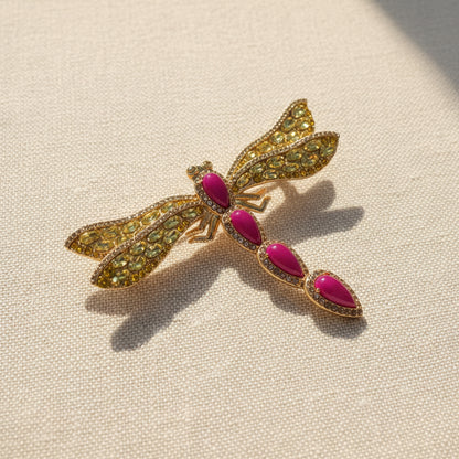A close-up of the oversized dragonfly brooch by The Civilis, emphasizing its bold, maximalist design and intricate craftsmanship. Perfect for structured coats or as a centerpiece accessory.