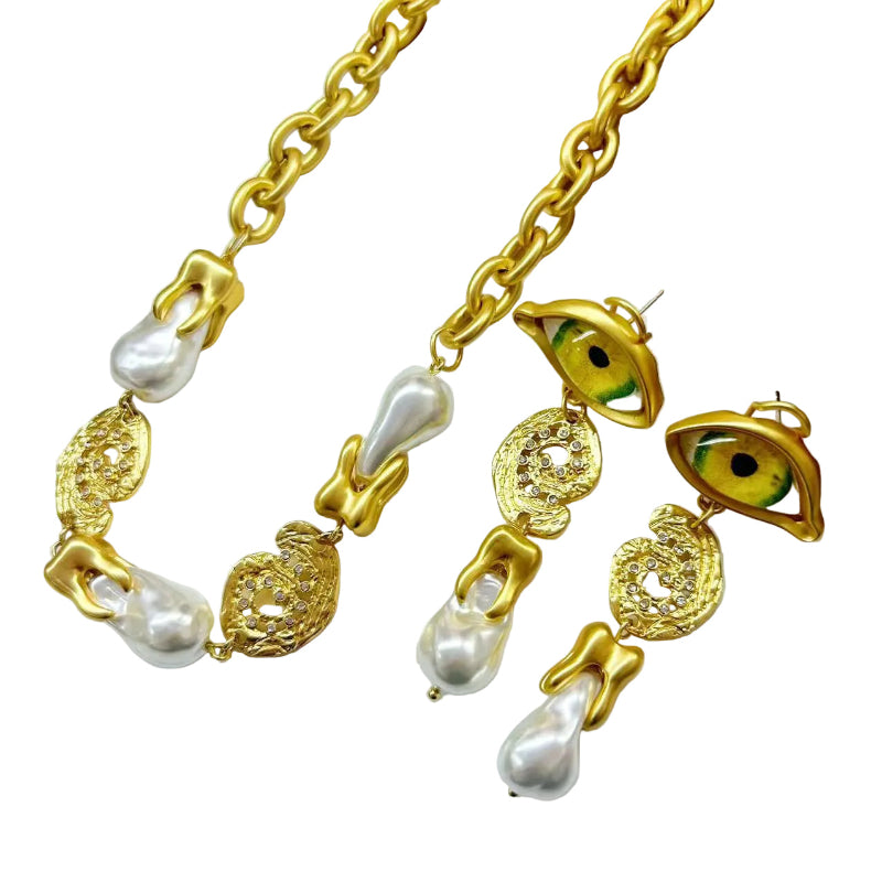 Devil's Eye Gothic Necklace and Earrings close-up detail showing crystal and baroque pearl accents
