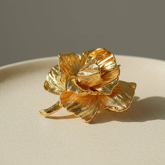 Large 18k gold plated textured rose brooch with liquid gold finish.