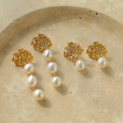 Baroque pearl drop earrings in 18K gold lava texture – single and triple pearl styles displayed together, The Civilis