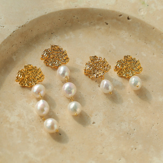Baroque pearl drop earrings in 18K gold lava texture – single and triple pearl styles displayed together, The Civilis