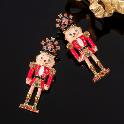 Vintage Nutcracker Soldier Earrings detail view - enamel & gold plating
