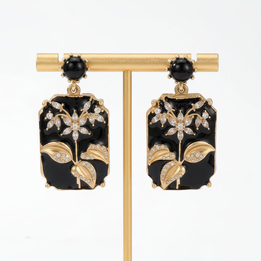 Vintage Chinese Plum Blossom Stud Earrings flat lay on white background