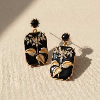 Black Enamel Plum Blossom Stud Earrings front view, vintage Chinese Art Nouveau style