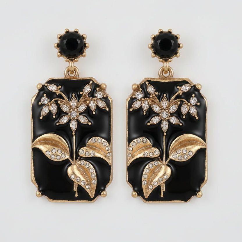 Black Enamel Plum Blossom Earrings close-up detail showing gold petal accents
