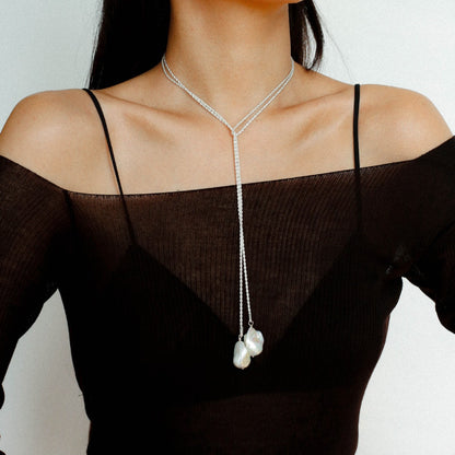  Model wearing long baroque pearl lariat necklace silver version twisted rope chain multi-way wrap necklace

