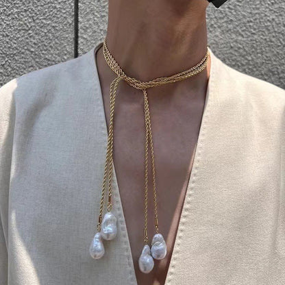  Model wearing two layered baroque pearl lariat necklaces stacked styling 18K gold plated versatile wrap necklace

