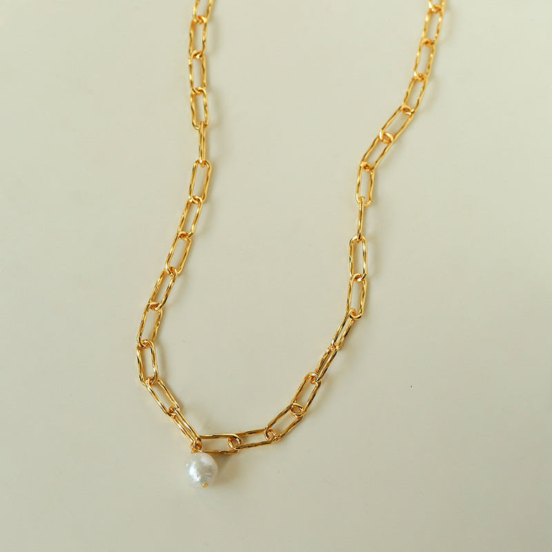18K gold plated paperclip chain necklace with baroque pearl pendant full view on beige background minimalist chunky link choker


