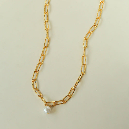18K gold plated paperclip chain necklace with baroque pearl pendant full view on beige background minimalist chunky link choker

